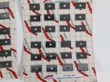 three pieces of paper with a red and black design on them