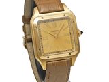 an image of a gold wrist watch with a brown leather band
