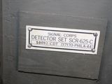 a sign on the door of a building stating that it is a detector