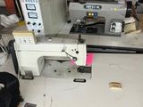 a sewing machine that is sitting on a table