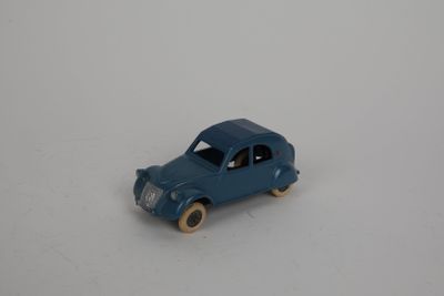 a toy car that is sitting on a white surface