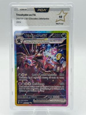 a close up of a pokemon card in a plastic case