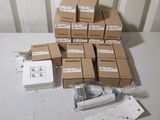 a lot of boxes of electronic equipment on a table