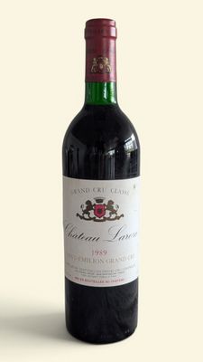 a bottle of wine that is sitting on a table