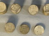 six different types of coins sitting on top of a table