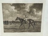 a black and white photo of a man riding a horse