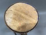 a close up of a small metal object on a table