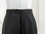 a close up of a mannequin torso in a white shirt and black pants