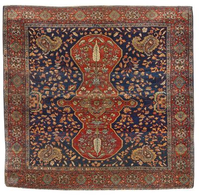 a blue and red rug with a floral design