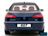 the back of a blue car with a license plate on it