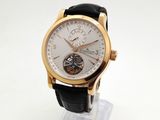 a gold wrist watch with a white dial and black leather strap