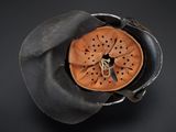 a leather hat with a hole in the middle