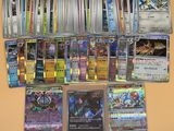 plusieurs types de cartes pokemon sur la table