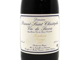 a bottle of wine that is sitting on a table