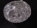 a clear glass bowl with a picture of a man on it