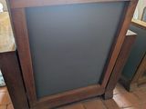 a tv that is sitting on the floor in the room