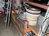a room with a bunch of items on the shelves