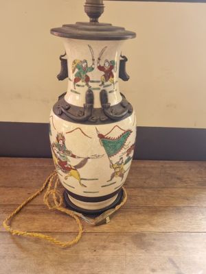 a lamp that is sitting on a wooden table