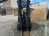 a forklift that is parked in a parking lot