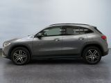 the mercedes gle suv is parked on a gray floor