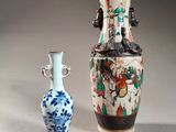 two vases sitting next to each other on a table