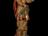 an image of a statue of a woman holding a child