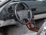 a car with a steering wheel and a dash board