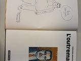 a book with a drawing of a man on it