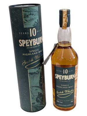 a bottle of speyburn scotch whisky next to a cardboard box