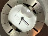 a clock that is sitting on a table