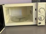 a microwave that is sitting on top of a counter