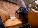 a car inside of a building with leather seats