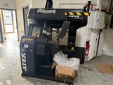 a machine that is sitting inside of a building