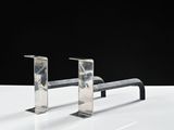 a pair of metal pipes that are on a table