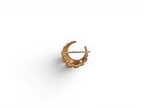 a small gold crescent shaped earring with a flower design
