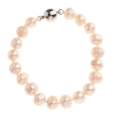 a close up of a bracelet with pearls on a white background
