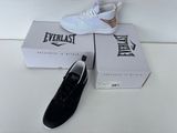 a pair of shoes that are on a box