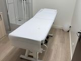 a room with a table and a shower in it