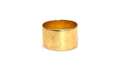 an image of a close up of a gold ring on a white background