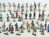 many figurines of different sizes and colors of soldiers