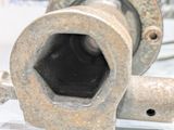 a close up of a metal object with a hole in it
