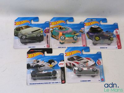 five hot wheels cars in each of them on display