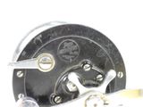 a close up of a fishing reel with a spool on it