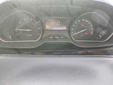 a close up of the dashboard of a car with the gauges on