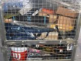 a metal cage with a bunch of items inside of it