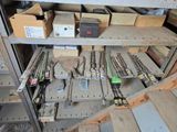 many different tools on the shelves in the room