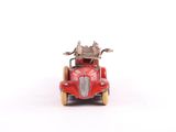 a red toy car with a motorcycle on the back