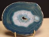 a large slice of agate sitting on a table