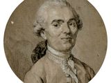une vieille photo d'un homme aux cheveux blancs, vêtu d'une veste marron