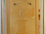 an image of a painting in a wooden frame on a wall